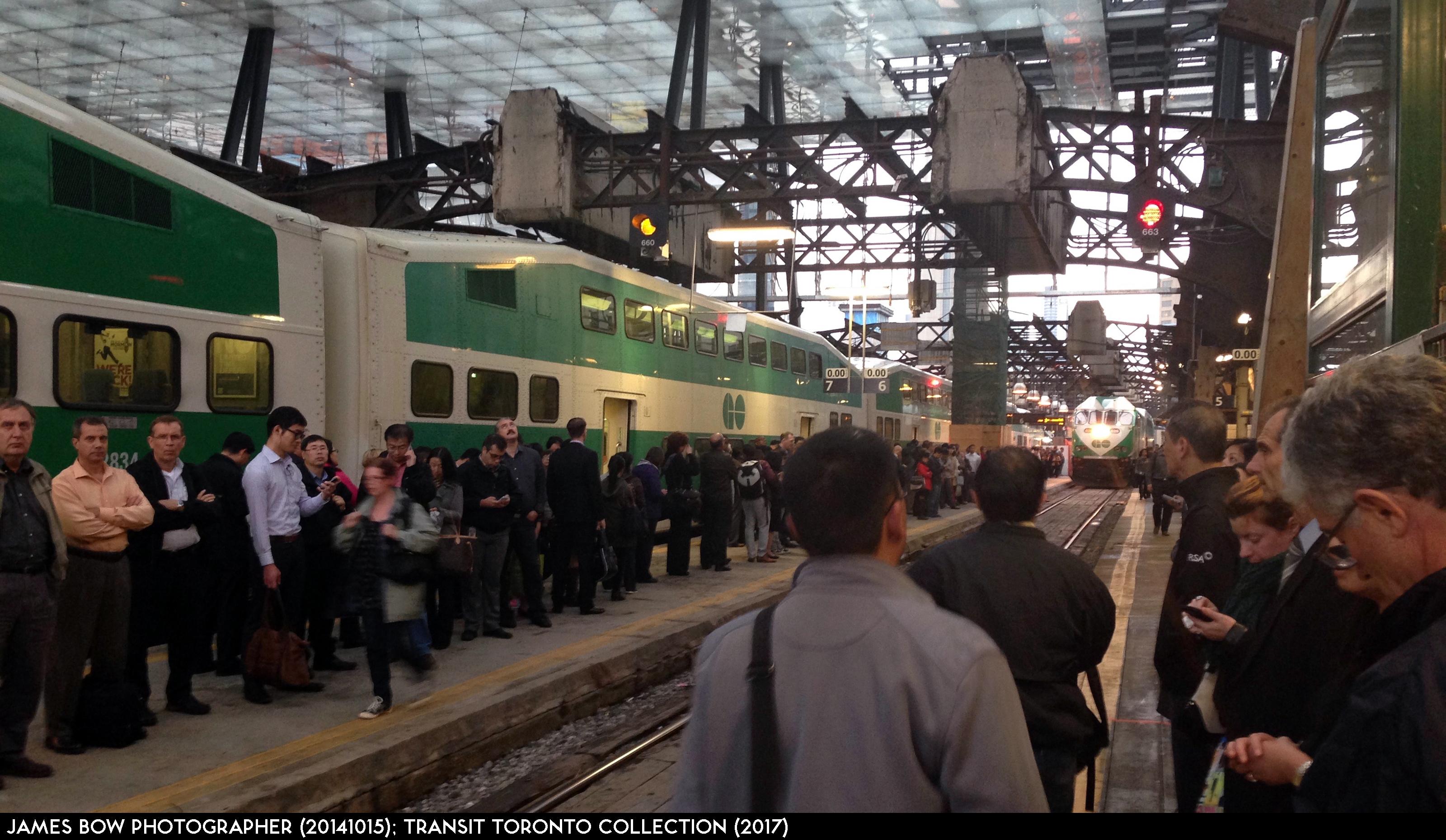 Image result for people waiting for  train in union station